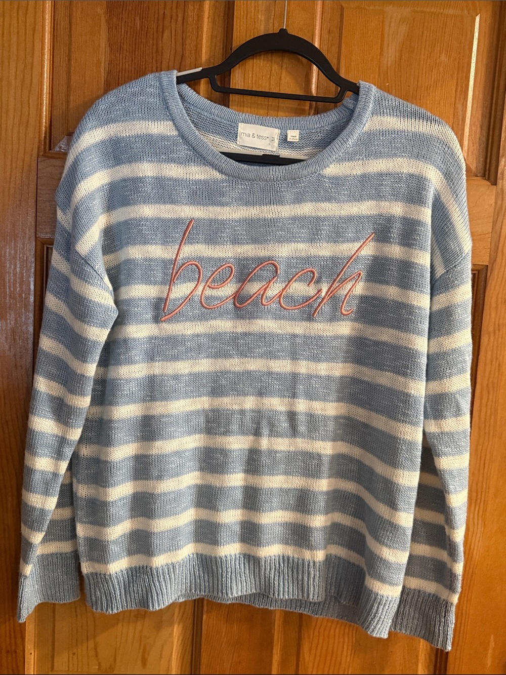 Mia & tess  striped sweater long sleeve with beach on it size medium.